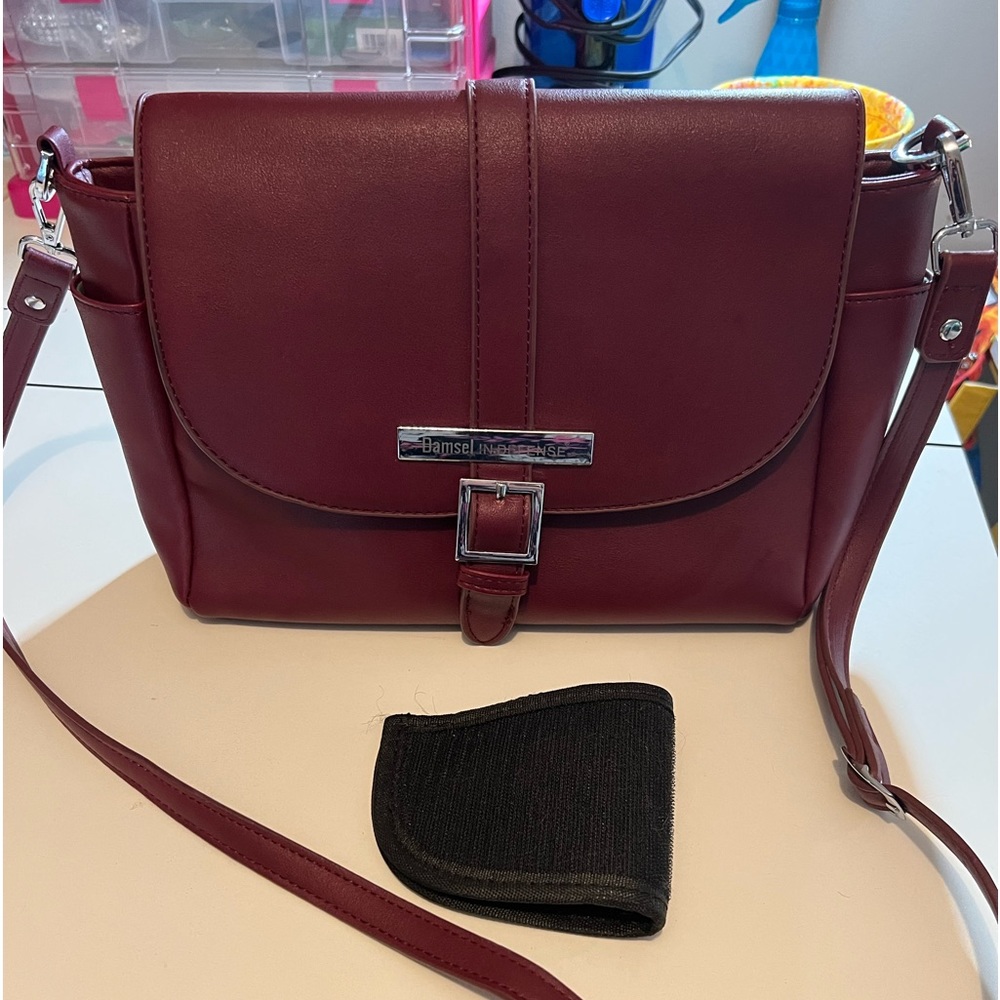 Damsel In Defense crossbody bag